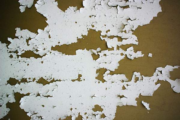 Flakes of white paint texture