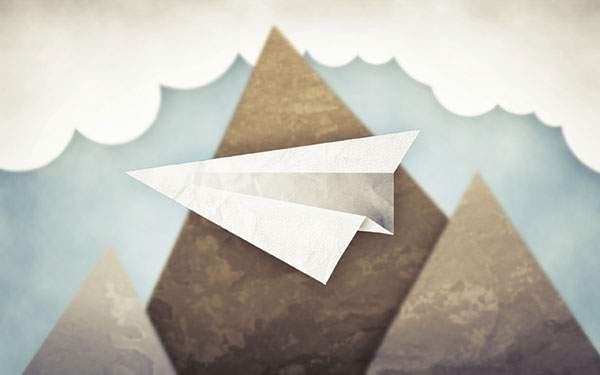 切り絵風のシンプルなデザインがおしゃれな紙飛行機と山と雲のイラスト